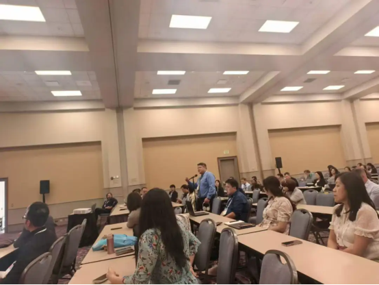 An audience member asks a question at the DIA 2026 China Town Hall.